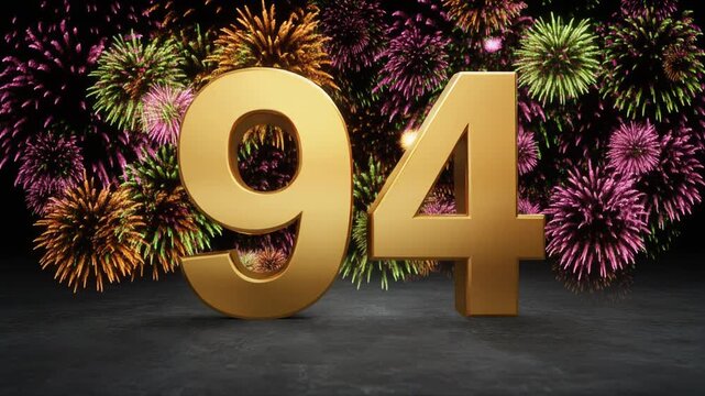 Gold number 94 with fireworks in the background. Festive scene for birthday or anniversary party