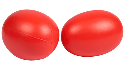 Two smooth, red, oval objects rest beside each other against a solid black backdrop, lit from overhead