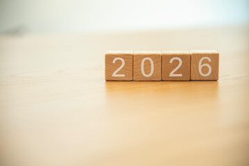 Craft wooden cube blocks 2026. Numbers on wooden blocks with copy space. 2026 happy new year idea concept.