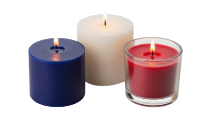 Three lit candles burning brightly red white blue against black