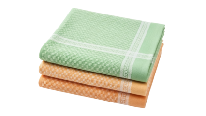 Isolated stack of soft checkered woven towels in green and orange home textile shop