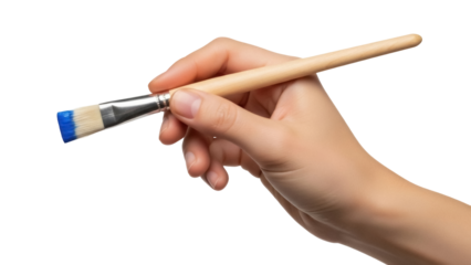 Isolated artist's hand holding a brush ready to paint, artistic, creative endeavor