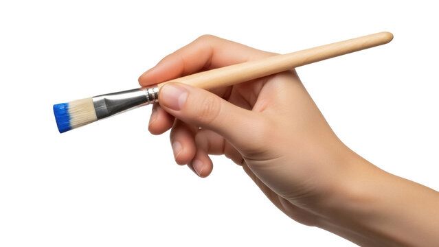 Isolated artist's hand holding a brush ready to paint, artistic, creative endeavor