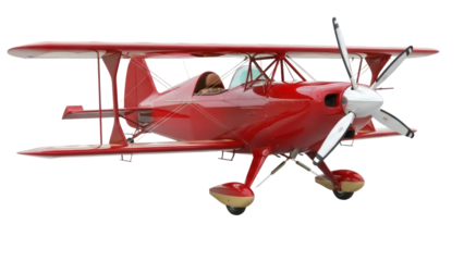 Isolated red biplane airplane with a propeller against a light backdrop, vintage aircraft