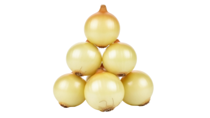 Isolated stack of golden onions, fresh vegetable and a pantry staple ready for recipes