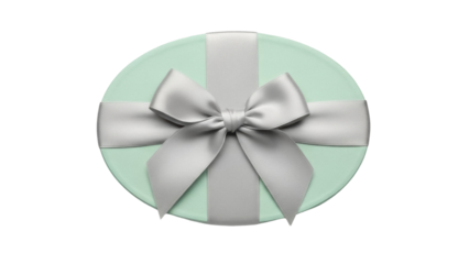 Isolated turquoise gift box tied with silver ribbon and a bow, perfect for surprises