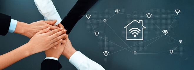 A diverse group of hands coming together symbolizes teamwork and collaboration in a digital environment, enhanced by a Wi-Fi icon representing connectivity. Gantry