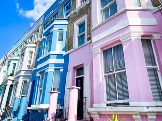 Vibrant blue and pink facades of buildings in the Notting Hill district in London
