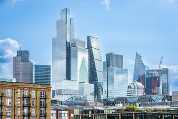 Wide-angle view of the dense cluster of skyscrapers in the City of London, UK