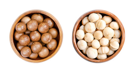 Macadamia nuts, in shells and peeled, in wooden bowls. Also known as Queensland, bush, maroochi, bauple, and Hawaii nuts. On the left side dried and unshelled, on the right side roasted nuts. Photo