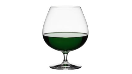Isolated glass with dark green absinthe drink on clear crystal stemware, no background