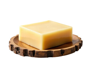 A pat of butter sits on a wooden plate.transparent background