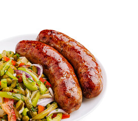 Sausages served with fresh vegetable salad in a bright setting