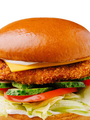 Crispy chicken sandwich with fresh toppings in a soft bun