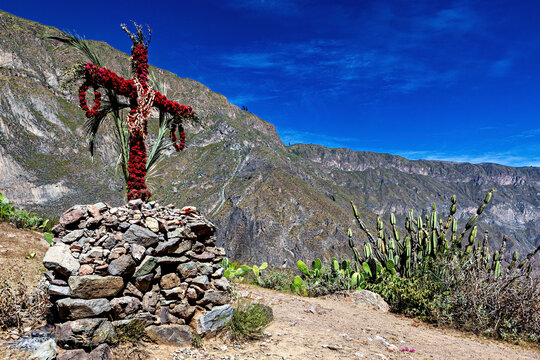 A Cross in the Landscape of the Colca Canyon in Peru