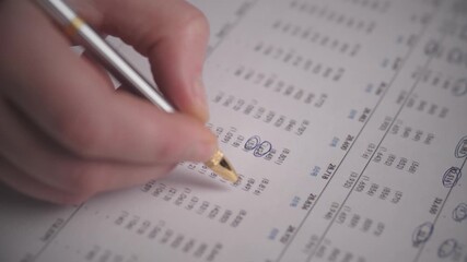 Caucasian Tax Preparer Circling Totals On Printed Tax Return With Precise Pen Strokes, Closeup Of Hand Highlighting Deductions And Figures, Tense Yet Professional Tax Season Atmosphere