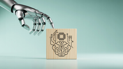 Robotic hand reaching for a block symbolizing artificial intelligence and machine learning