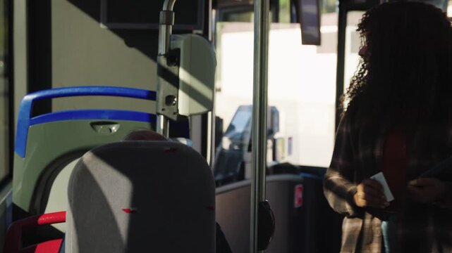 African american woman paying for bus fare