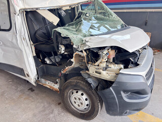 Front View of a Damaged White Van After a Fatal Traffic Accident