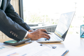 Experienced lawyer providing legal guidance in office, reviewing contracts, documents, finance,...