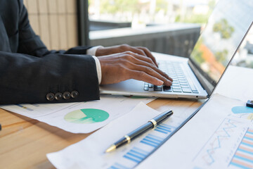 Experienced lawyer providing legal guidance in office, reviewing contracts, documents, finance,...