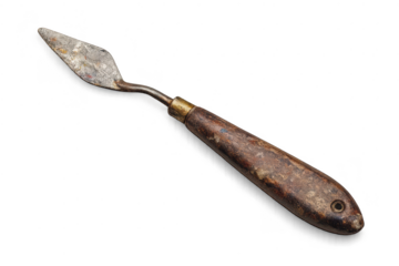 Old painting palette knife with transparent background for design work.