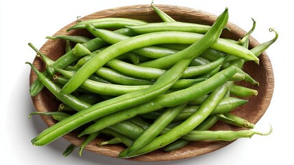 Green beans in a wooden plate on a white background, top view	