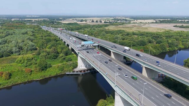 M6 Motorway, Lymm, Cheshire, UK, August 15, 2025; aerial view of the M6 Motorway Thelwall Viaduct bridge over the Manchester Ship Canal and River Mersey, Lymm, Cheshire, UK.