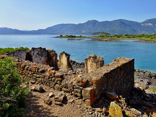 Greece - view on the coast of Monolia island near  the town of Kamena Vourla on the mainland