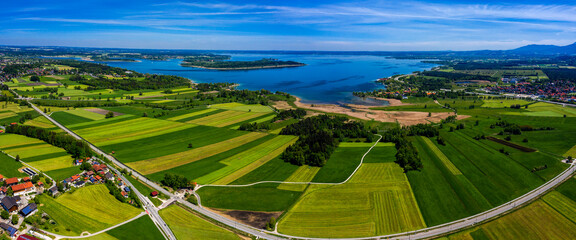 Aerial panoramic view of the Chiemsee lake in Bavaria, Germany on a sunny day in summer.