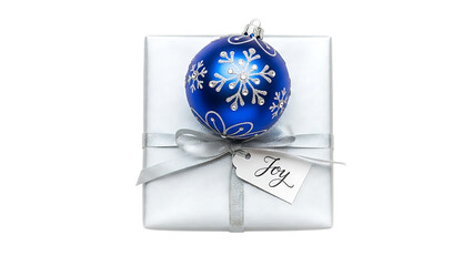 White gift box with blue snowflake ornament and joy tag