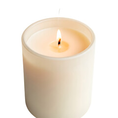 White candle with lit flame on black background cream