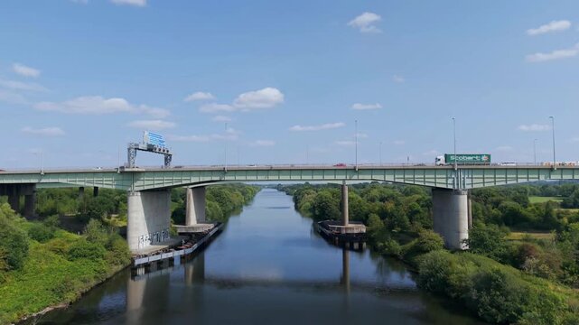 M6 Motorway, Lymm, Cheshire, UK, August 15, 2025; aerial view of the M6 Motorway Thelwall Viaduct bridge over the Manchester Ship Canal and River Mersey, Lymm, Cheshire, UK.