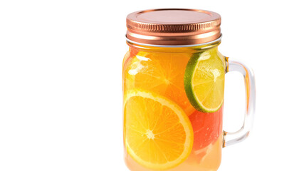 Refreshing citrus-infused water in a mason jar, with slices of orange, lime, and grapefruit. Black background
