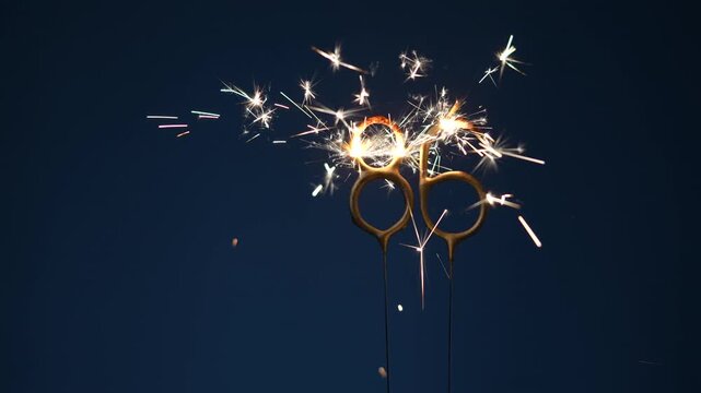 86 years celebration festive background made with Bengal fires in the form of number Eighty six.