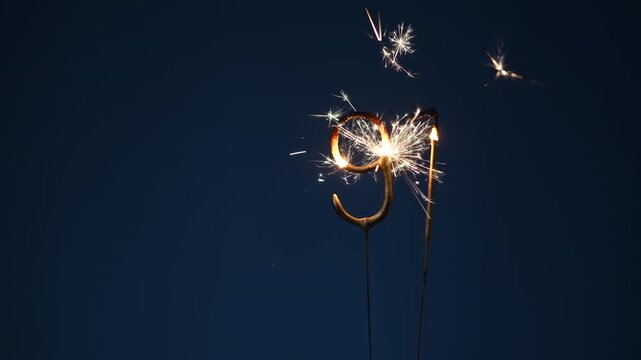 91 years celebration festive background made with Bengal fires in the form of number Ninety one.