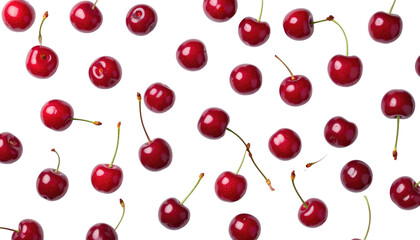 A vibrant, overhead shot showcasing several bright, red cherries scattered across a stark black background. Stems varying in length