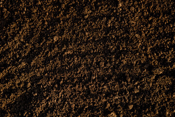 Close up of black soil background