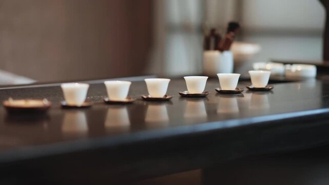 row of tea cup on table