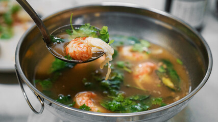 Asian seafood soup with shrimp in pot