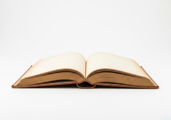 Open antique book displays aged, blank pages resting on a clean white surface