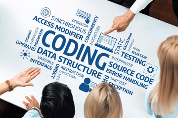 A group of professionals engaged in a collaborative coding session, emphasizing data structures and coding principles on a white table in a modern office setting. Amity