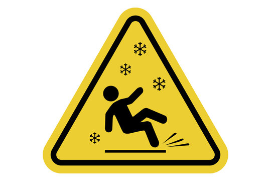 Snow Warning Sign Winter yellow storm warning road sign during heavy snow and blizzard conditions. Triangular road sign with a snowflake symbol covered in snow, warning of icy and slippery roads