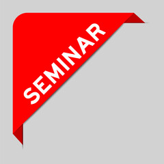 Red color of corner label banner with word seminar on gray background
