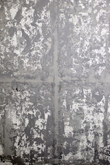 The gray and white abstract background texture with random wall-like patterns and subtle cross motif offers an interesting canvas for creative projects and artistic expressions.