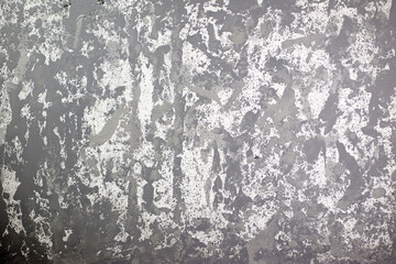 Creative gray and white abstract background showcasing a textured design that evokes an old plastered wall, ideal for decorative wallpaper with a unique gray spotted pattern.