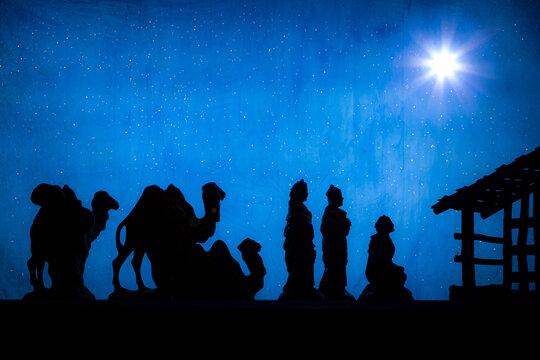 Wise men Christmas silhouette blue sky