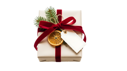 White gift box with red velvet ribbon and dried orange slice present christmas