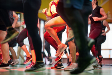 Group of people running in place on workout class. Healthy lifestyle, sport, workout concept