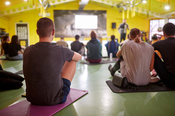 Group of people  on Seminar about fitness. Healthy lifestyle, sport, workout concept
